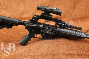 Bushmaster Model XM15-E2S 5.56 Semi Automatic AR-15 Style Rifle w/ Scope